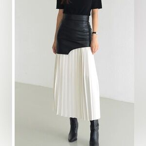 Asymmetrical leather (faux)/chiffon patchwork skirt from Commense
